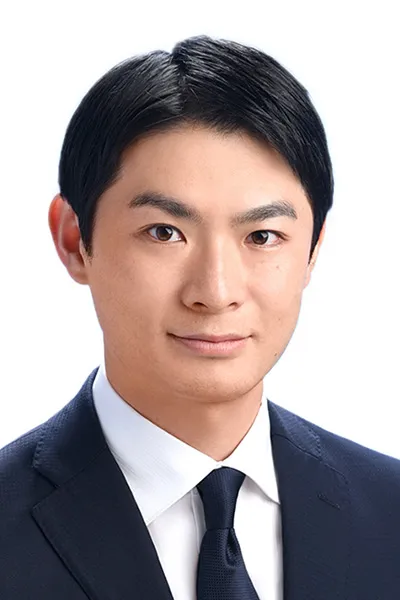 村松 賢治 氏